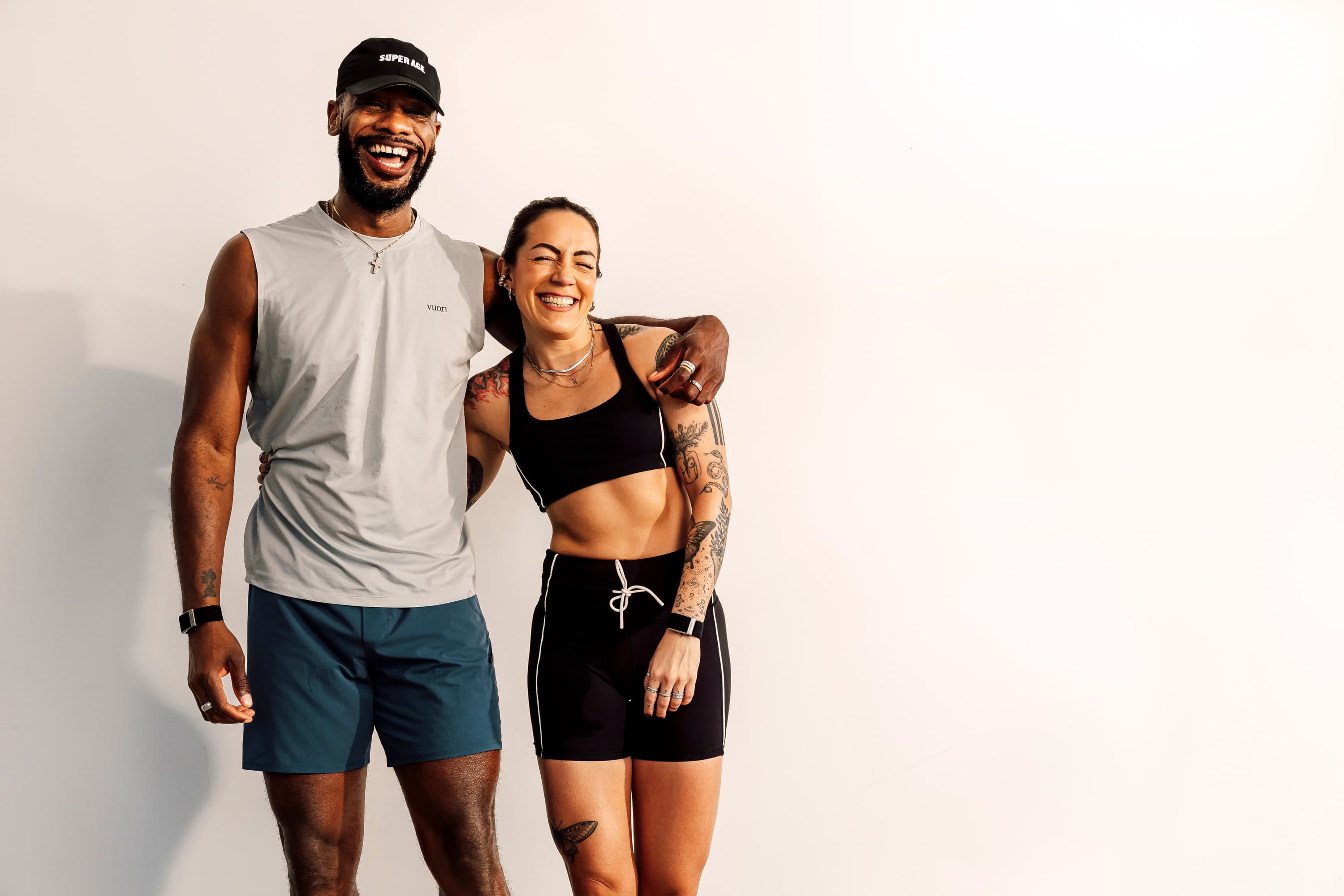 Two Super Age Games athletes smiling together